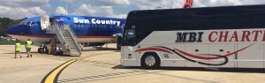 MBI Charters bus rental fleet at Southwest Florida airport - MBI Charters